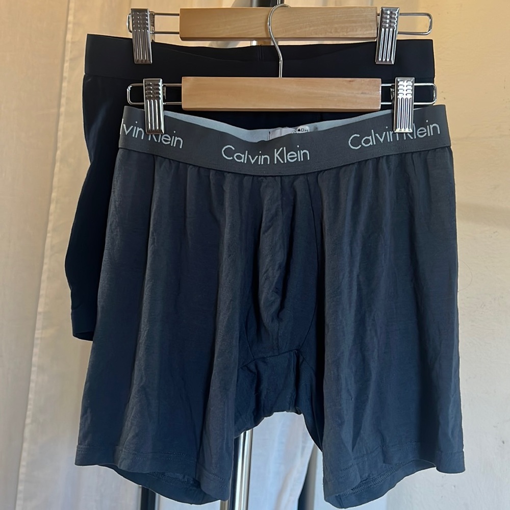 Two items: Calvin Klein gray and Uniglo navy blue boxers